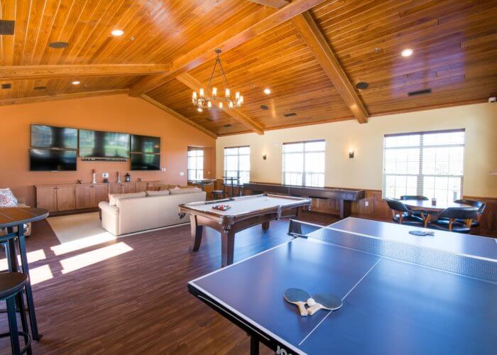 clubhouse with pool table and ping pong table